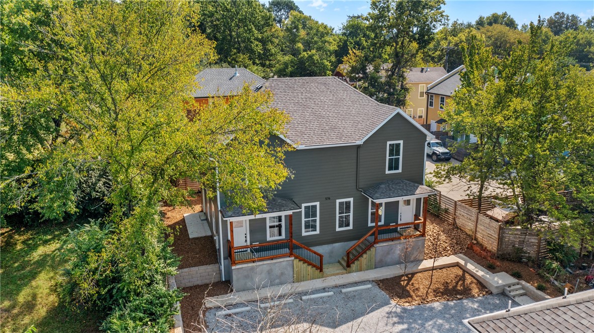 Excellent investment opportunity just off MLK in Fayetteville! This brand-new duplex package includes two complete units, each thoughtfully designed with a modern, functional layout. On the main level, every unit features a spacious living room, kitchen, dining area, half bath, and in-unit laundry for everyday convenience. Upstairs, each unit offers two large bedrooms with private full bathrooms, providing the perfect setup for roommates, families, or guests. With its prime location near shopping, dining, and easy access to I-49, this 2-unit package combines strong rental potential with quality new construction.