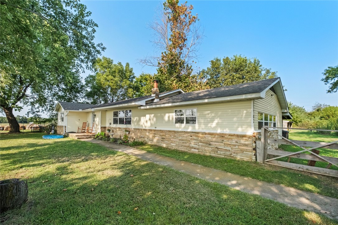 Do you want to have a home far enough out to call the country, small acreage, homestead opportunity, yet close enough to town, restaurants, shopping? Look right here, your home awaits you! This is a very quaint country home, hidden off the road, 3 bedrooms, 2 bathrooms, with a well house and outbuilding for storage or chickens/rabbits, some beautiful updates within, great location close to Siloam Springs, Lincoln, close to Fayetteville and NEO...Never heard of Summers? You are missing out! Washington County, AR come see for yourself! Call today!