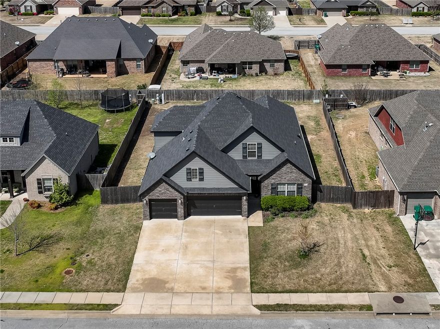This 2017 1.5-story, traditional styled home w/4-bedrooms, 3-baths, 3-car attached garage w/storage, landscaped front yard w/front door porch, wood fenced backyard w/gates on both sides/one side w/double gate, covered back patio, spacious yard waiting for your green thumb, separate laundry room w/folding area hanging rod & storage, kitchen is large w/granite counters & bar, good-sized pantry closet, under counter lighting, farm style sink, 5-burner gas stove top & appliances that convey. Eat-in area, entry foyer access, some solid wood floors, carpet & tile, gas fireplace in living room, wood beams and vaulted ceiling, amazing primary suite with extra large closet & built-ins, large parking driveway. So many features too numerous to mention. Roof (2017), HVAC system & HotWater Tank all in 2017. All major systems in good working order and Seller is offering Buyers a 1-year 2-10 Home Warranty w/acceptable offers.