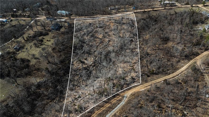 Discover 5 acres in a prime location just 7 minutes from Hobs State Park, 13 minutes to the lake, and 6 minutes from Pigeon Roost Trailhead. 
You don't want to miss out on this rare chance to own land in such a desirable area.