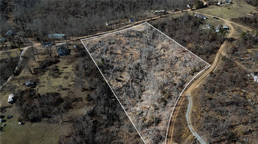 Discover 5 acres in a prime location just 7 minutes from Hobs State Park, 13 minutes to the lake, and 6 minutes from Pigeon Roost Trailhead. 
You don't want to miss out on this rare chance to own land in such a desirable area.