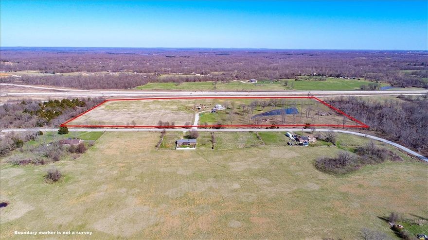 This property is suitable for the residential developer, commercial developer and/or would be a great place to give your business a home office. Only a few minutes away from the hustle and bustle of northwest Arkansas that's right off the new Bella Vista Bypass, which is the last exit just before entering Missouri. With northwest Arkansas rapidly developing and expanding, this property is in a very desirable location because it is centrally located within minutes from Bentonville, Rogers, Centerton and Bella Vista. This property has access from two roads, Rocky Dell Hollow on the west side and Bertschy Ln ( which is a dead end road meaning minimal traffic if any trucking companies out there are interested) to the east. 24.77 acres zoned agricultural. Gravette officials stated it shouldn't be a problem getting rezoned with the proper plan. Electric and water on sight, and sewage coming in the near future. Mainly flat, clear usable land with a small pond on the south side of the property.