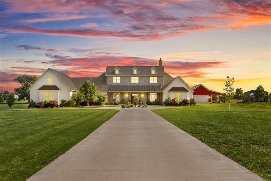 Stunning custom Colonial-style farmhouse on 5.4 acres in Bentonville with over 5,800 sq ft of living space and 1,400+ sq ft of covered patio. Main level features 3 spacious bedrooms with en-suite baths; upstairs offers 2 oversized bedrooms with a Jack & Jill bath. Chef’s kitchen includes Wolf range, built-in fridge/freezer, farmhouse sink, ice maker, and custom cabinetry. Butler’s pantry with prep sink, floor-to-ceiling storage, and second dishwasher. Enjoy outdoor living with a large in-ground pool, mature landscaping, and multiple covered patios. Circular driveway adds curb appeal and convenience. Ideally located between XNA, Pinnacle Promenade, and downtown Bentonville—offering luxury, privacy, and accessibility.