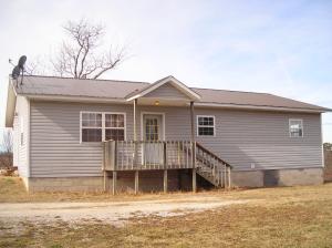 Great Place to Live! Only about one mile off of the pavement is this 3-Bedroom Home that has nice size rooms to enjoy also a rear deck. The Owner has just upgraded the heat pump. The property is all wooded. Price to Sell at $99,000.