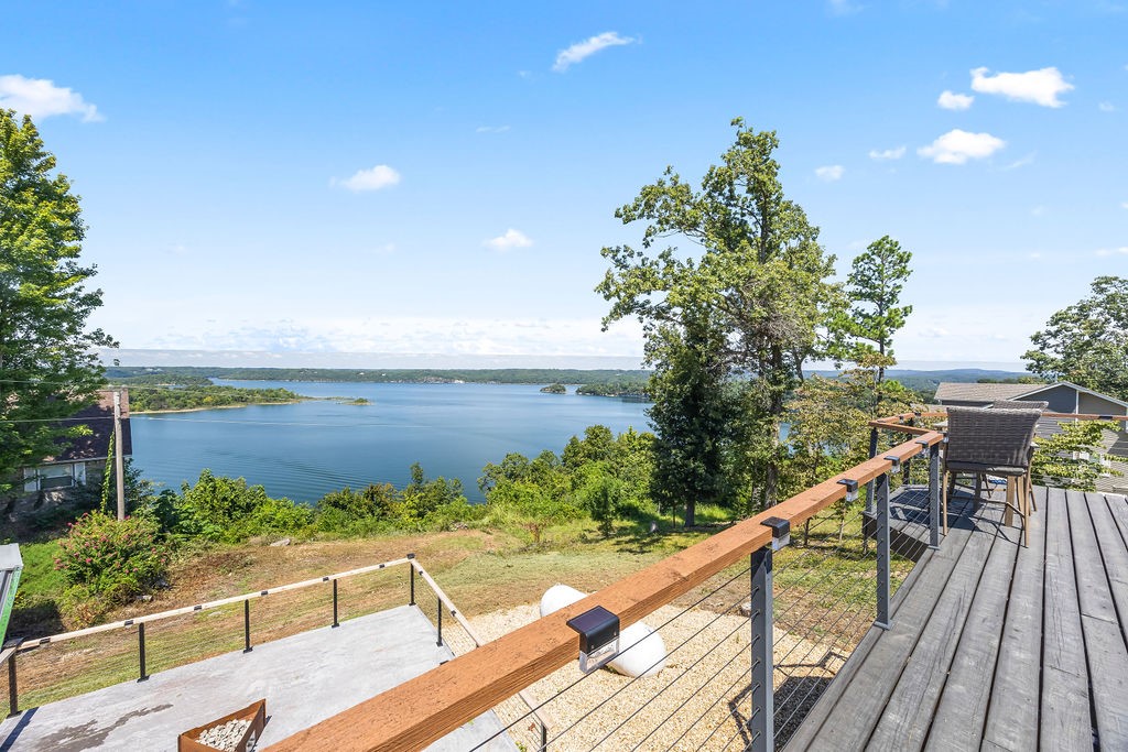 Experience STUNNING lake views every day from this beautifully updated 3 bed, 3 bath home. Designed for comfort and style, this property offers open living spaces filled with natural light, modern finishes throughout, and plenty of room for entertaining! Step out onto the newly covered back deck perfect with unmatched views of Beaver lake, and less than 10 minutes to Downtown Rogers and all of the fun it has to offer! Incredible opportunity for Air BnB or VRBOās! New roof, flooring, paint etc. Donāt miss out, come check it out today!