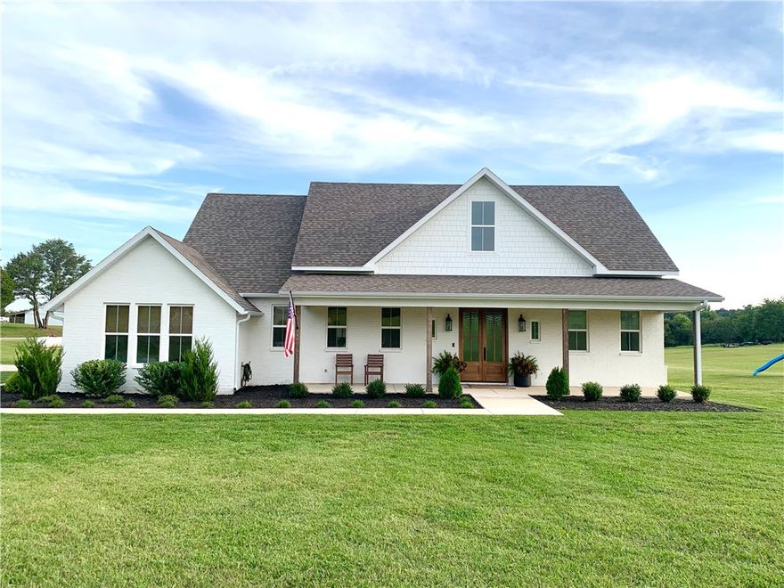 The property of your dreams just hit the market. This stunning custom built home on 3.75 acres offers three bedrooms, 2 full baths, and a half bath on the ground level. Upstairs, enjoy the large versatile bonus room that can serve as an additional bedroom, equipped with its own half bathroom and closet or perfect for a child’s playroom/game room. The living room boasts vaulted ceilings and large windows, creating a welcoming atmosphere. The kitchen features stainless steel appliances, an expansive island, a large pantry, and a 6 burner gas range. An additional office space on the main floor provides a perfect spot for working from home. Step outside to a large back patio, perfect for entertaining. You can finally have your hobby farm with a 50ftx70ft fenced area and an 8ftx24ft barn perfect for goats or miniature horses. Enjoy the perks of being just 5 mins away from Lake Sequoyah for your outdoor adventures and less than 15 mins to Mission & Crossover. This home is a true gem waiting for you to make it your own.