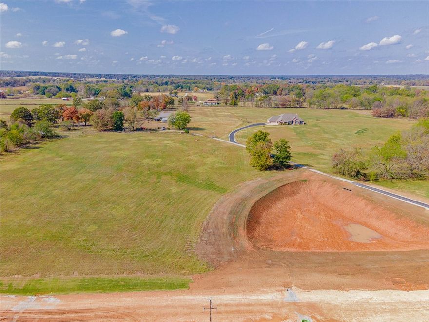 Prime Development Opportunity! Located adjacent to Bentonville West High School. Surrounded by residential subdivisions. Frontage to what will soon be Wolverine Blvd. 2 ponds. Nice level land perfect for development. Will consider subdividing. Agent is related to seller. **Must have an agent present to view property.**