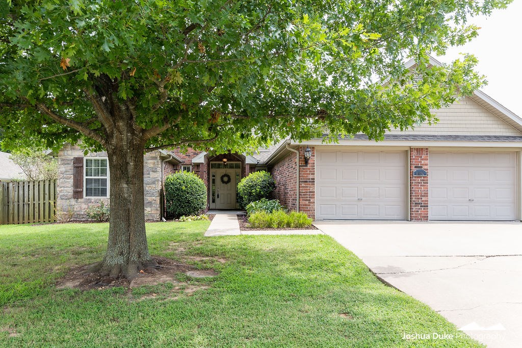 Charming 3 or 4 Bedroom/2 Bath home in West Fayetteville! This 1,748 Sq Ft home in Fairfield Sub. has an open and split floor plan, wood floors, a gas log fireplace, custom trim, foyer, jacuzzi tub, oversized covered back porch, new lighting, landscaping, oversized garage, extra kitchen cabinet space,. This house has a very easy floor plan with room to add another bedroom if needed. Wooden play set to convey, rear and side yards on a private street with no drive through, raised garden beds in back, privacy fence