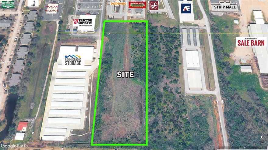 6.95 Acres just off Hwy 412 (behind Plaza Tire Service and Popeye's). Ideal location for Big Box Retail, Hotel, Flex Space, Restaurant, Multi-Family, Mini Storage. 8" Water, fire hydrant, and sewer main at property line.