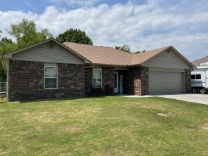 Looking for that Immaculate home just minutes from town? Then this is a must see! This low maintenance home features an open floor plan, 2 car garage, food pantry, ceramic tile and carpet flooring, fenced back yard and a 12X20 shop. Sorry the hot tub does not convey! Don't wait or you'll be late!