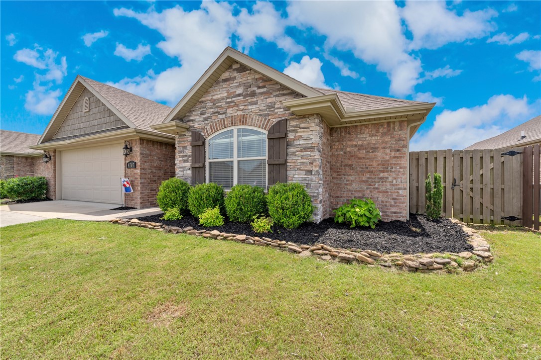 Super cute 3 bed/2 bath home in the desirable Villages of Sloanbrooke neighborhood in west Fayetteville. Split floorplan with wide front entry, open living area with wood floors, recessed lighting and gas burning fireplace with mantle. Kitchen features tile flooring, white cabinets, stainless steel appliances, double oven range, large pantry, island with extra storage and a bar for added seating. Large, private primary suite with tray ceiling, large walk-in closet, dual vanities, jetted tub and separate shower. Bedrooms with large closets are adjacent to guest bath. Dining area opens to the fenced back yard. Relax on the large covered back porch with TV mount, gas hookup, ceiling fan and extended patio. Granite countertops throughout, neutral paint with new carpet in bedrooms in 2023. Laundry room off the garage with cabinets. Convenient location. Refrigerator, washer, dryer, TV and Ring doorbell convey with accepted offer.