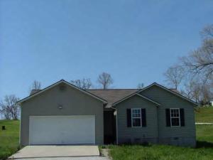 3 bedroom, 2 bath, double garage, vinyl siding, some minor repairs needed.