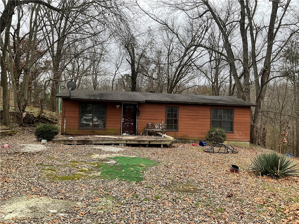 Small home on a .47 acre lot close to lake. Cash or in-house loan. Being sold AS-IS. Agent owned