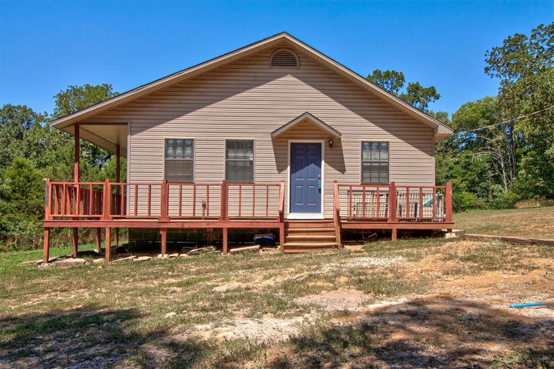 This property offers a beautiful country setting, less than 5 minutes off the bypass, making your commute to Fayetteville a short 15 min drive with all the luxuries that the country has to offer.Ā The home is a modern farmhouseĀ with an open kitchen/dining/Livingroom concept. With 3 bedrooms well sized, 2 full bathrooms. OutsideĀ offers a secluded open acre that gets a nice amount of sunlight ready for any outdoor opportunity you want to developĀ (horseshoeĀ pit, fire pit, gardeningĀ is just some great suggestions) Enjoy your early mornings or late afternoons sitting on the wrap-around porch with limitedĀ neighbors and the tranquility of nature. Book your showing today!