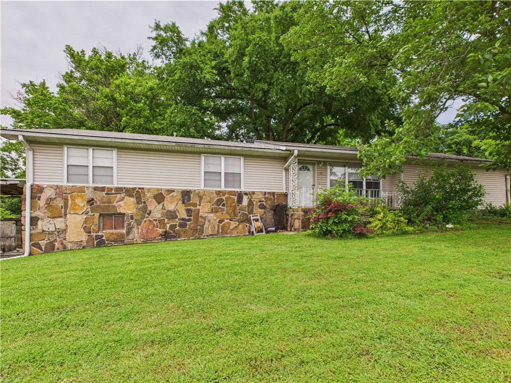 Charming Ozarks Home ā Welcome to your ideal home in the heart of the beautiful Ozarks! This inviting 3-bedroom, 1.75-bath offers easy access to the essentials of town living. Set on a generous lot, this home features a classic layout with a welcoming atmosphere. The large living area has plenty of space to relax or entertain. This three-bedroom home provides room for family, guests, & includes your own office space. The ensuite has a walk-in shower for easy access. The unfinished walkout basement is a blank canvas with endless potential, ready for a home gym, workshop, or additional living space & ready for your vision. Enjoy an attached garage & a large yard perfect for outdoor gatherings. Located close to grocery stores, shopping, and dining, with seclusion and accessibility. Not far from lakes and rivers, you'll have endless opportunities for fishing, boating, and exploring the beauty of the Ozarks. This home has the location, space, and potential to be something truly special āschedule your showing today!