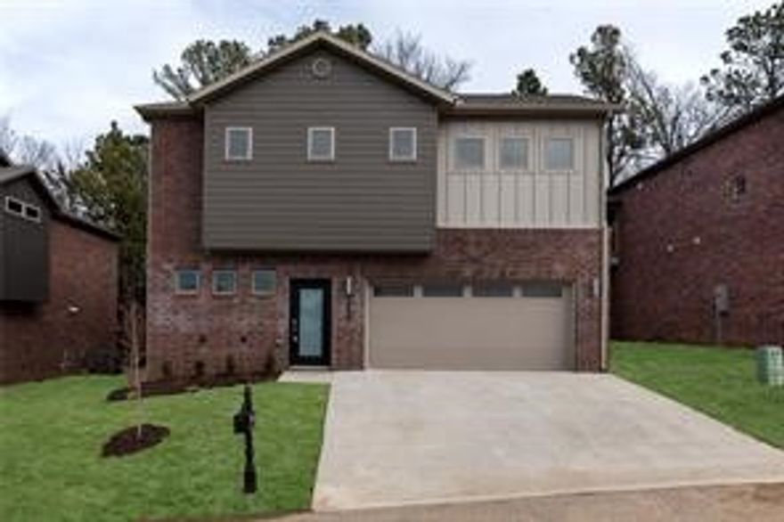 Built in 2017, this home is impeccably outfitted. The main living spaces are on the second floor and downstairs boasts two bedrooms, laundry room and full sized washer-dryer, & bathroom with large walk-in shower. Upstairs, granite countertops, gas range, & ample counter space make the kitchen a chefs delight. The screened in porch is a peaceful getaway. A massive main suite offers large soaking tub, oversize glass shower, large walk&in closet with built-ins. Minimal up keep for lux living in the heart of Fayetteville.