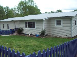 Come home to this immaculate, move in ready, 3-4 bedroom, 2 bath home. Spacious kitchen,living and dining rooms. Fully fenced front & back yards. 16x20 deck, private hot tub area, large two car garage w/workshop PLUS huge RV carport. Beautiful, efficient gas fireplace, triple pane energy efficient windows, split floor plan. Many updates! Qualifies for 100% RD financing! Sq Ftg, room sz approx.