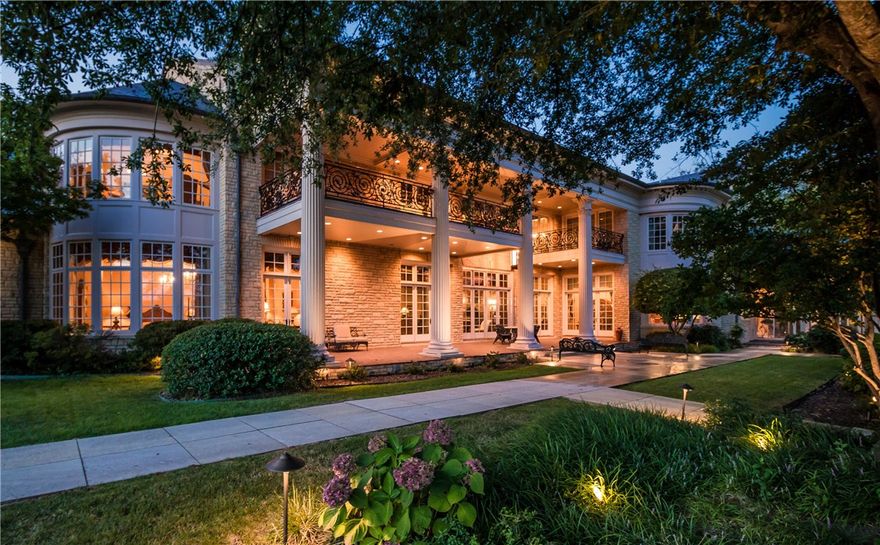 Behind the austere, formal limestone facade of this Neoclassical estate is a rich, intricate interior of style, elegance, and grace. Its 14,985 square feet of living space is situated on a 1.56 acre golf front lot enhanced with formal gardens, fountains, a koi pond and a lavish swimming pool. Finished to the highest standards, combining ornate details and grand architectural style throughout. Two luxurious levels are adorned with marble floors, custom carpets, decorative ceilings with crystal chandeliers, gold-leaf columns and trim, and a grand foyer with a sweeping staircase. Offering four en-suite bedrooms, numerous receptions rooms, a bar, solarium, library, dining room and a gourmet kitchen. The grounds are enhanced with illuminated terraces, a motor court with four-car garage, a garden courtyard, a granite cobblestone paved circle drive, and a new davinci roof.