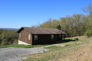 Three-bedroom, two bath home with a phenomenal view. This home is less than 2 miles to town and has nearly 4 acres of property. Sit on the large back deck and enjoy the panoramic countryside views. All new kitchen appliances and washer & dryer included. Don't miss this one it won't last long!