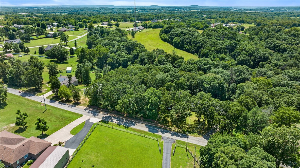 Let the freedom and peace of this 2 acres set you free! Only a short drive right into town or a quick hop and skip over to the casino on the edge of Siloam for all you poker loving buyers. This land sets up perfectly for a home and has plenty of space to spread out.