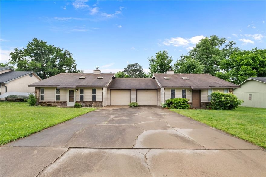 Investment Opportunity in Rogers! This 2,040 sq ft duplex features two 2-bedroom, 1-bath units—perfect for generating income or owner-occupancy. Live in one side and rent the other to help offset your mortgage. Each unit offers a functional layout and private space, plus a fenced backyard for added appeal. Ideally located near shopping, parks, walking trails, and bike trails, making it highly desirable for tenants and homeowners alike. A smart addition to any portfolio—don’t miss it!