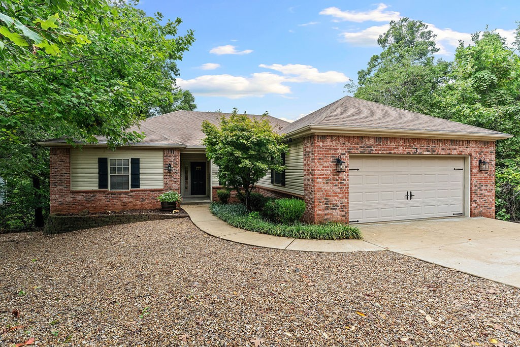 Welcome to this charming Bella Vista home featuring an open layout and desirable split floor plan. Offering 3 bedrooms and 2 bathrooms, this home is designed for both comfort and functionality. The spacious living area flows into the kitchen and dining spaces, making it ideal for everyday living and entertaining. Step outside to a large deck that overlooks your own private, tree-lined backyard. Even better—the lot next to the home is included, providing extra space, privacy, or future possibilities. Nestled in a peaceful setting yet close to all Bella Vista amenities, this property offers the perfect blend of comfort, convenience, and opportunity.