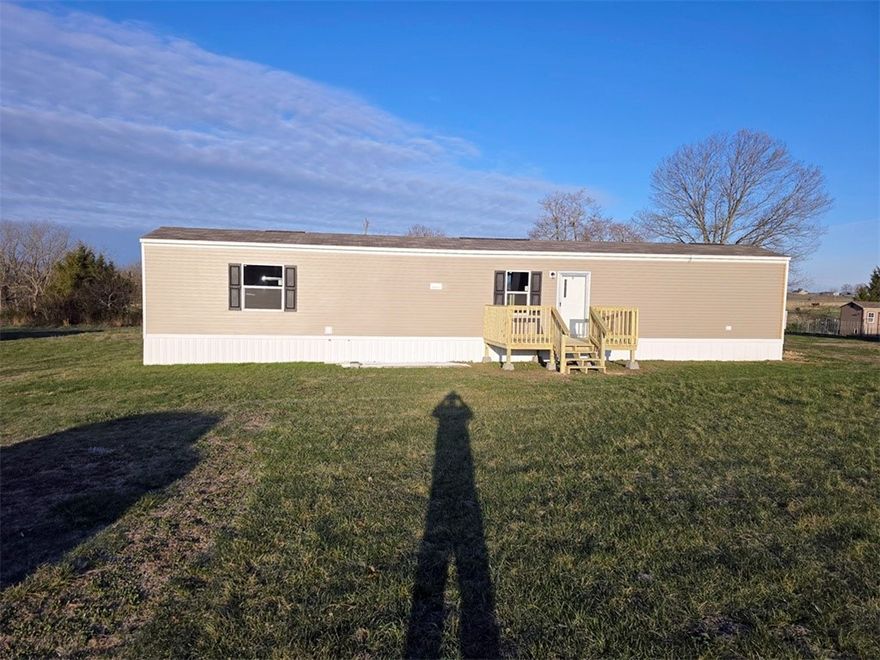 New 3 bed 2 bath manufactured home with porch on a half acres lot. Will qualify for VA, Rural Development and FHA loans. Near lakes and rivers. Come and take a look!