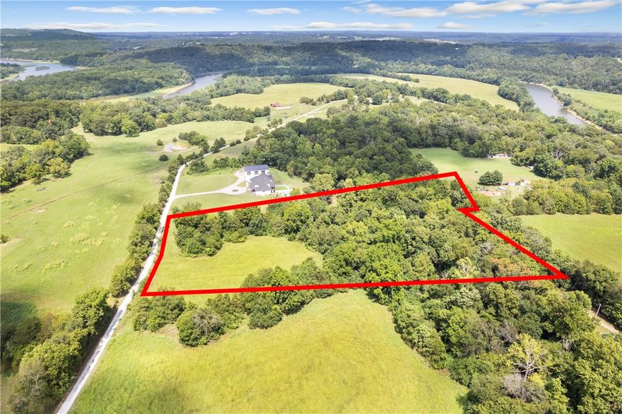 Discover a rare gem in Fayetteville! This expansive 6.9-acre lot, nestled near the serene Beaver Lake, offers endless possibilities for your dream project. Whether you envision a private retreat, a stunning new home, or a lucrative investment, this property provides a unique opportunity to create your ideal space. Enjoy the natural beauty and tranquility of the surrounding landscape while being conveniently close to local amenities and recreational activities. Don’t miss out on this exceptional piece of land – your perfect canvas awaits!