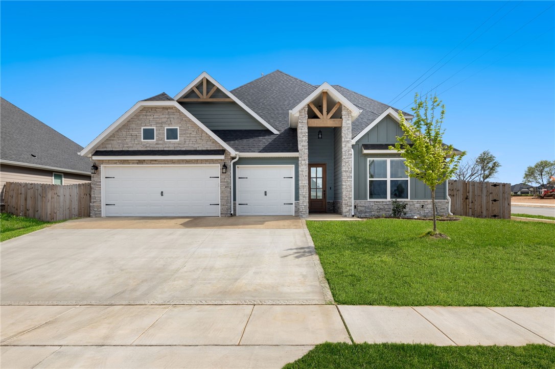Unbeatable location on a north-facing, premium corner lot that's walking distance to both Bentonville West and Gamble Elementary! This two-year old Craftsman-style home flows effortlessly with open, light-filled roomsāthanks to striking two-story windows flanking the fireplace. Design upgrades include shiplap and stained beams. In the kitchen find double islands, farmhouse sink, gas range, granite countertops and a massive pantry. Enjoy grilling and a second gas fireplace on the covered patio, plus extra outdoor storage, as well. Youāll be wowed by the spectacular ownerās suite with more beams and shiplap, a huge closet connecting to the laundry, dual vanity, soaking tub, and a dramatic double-entry shower! Downstairs boasts a second en-suite. Upstairs, find two more beds and a large bonus/flex for family time or home office. This home has gutters and fencing, making it better than newā plus skip the hefty new construction deposits. Move in with plenty of time to enjoy summer at the neighborhood pool.