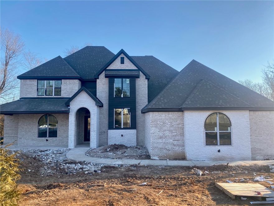 This new construction home has a gourmet kitchen that flows seamlessly into the living, dining, and breakfast rooms and is complete with quartz countertops, stainless steel appliances, oversized island, and walk-in pantry.  The French doors on both sides of the living room fireplace lead to a large covered back patio with vaulted ceilings.  The spacious owner's suite has a sizeable walk0in closet, and a fabulous bathroom with dual vanities, a makeup vanity, a large walk-in shower with bench, a free-standing tub, and a water room.  There is one more bedroom and an office on the first floor.  Upstairs, you will find a walkway that overlooks the living room below on both sides.  There are 3 bedrooms upstairs with walk-in closets and a large full bathroom with a soaking tub and shower combo.  The three-car garage also gives you additional storage space.  *AGENT OWNED*