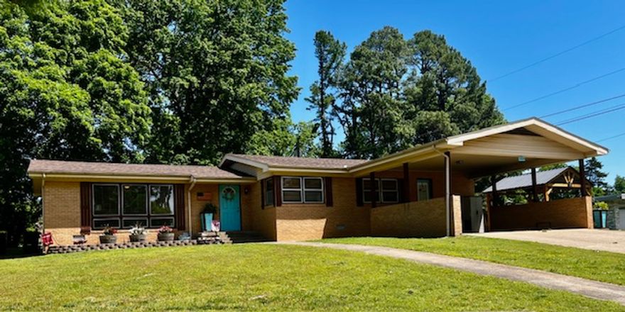 Here it is.... that comfortable, well-constructed move-in ready home you're looking for! This meticulously remodeled, three bedroom, two and a half bath brick house sits in the desirable Western Hills subdivision, only minutes from downtown, post office, industrial park, health care facilities, and high school. Interior features include LVP flooring, freshly painted ceilings and walls, a fully renovated kitchen with coffee bar, pantry and energy efficient appliances, new cabinets, farmhouse sink and more.   So many extras like the gas fireplace, jetted tub and ceiling fans make this the comfortable choice for your family.  But there's more... step outside and observe the new roof, new steel front door & shutters, double carport, flower beds and a new gazebo/patio, perfect for grilling, rest and entertaining.  You will also find a 16 x 22 workshop with electric service and separate shed for lawn equipment.  A resource binder has been prepared to document all upgrades and pertinent information for your review..