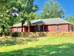 Looking for a home that's in the country, but still close to town? You have found it!! This 3 bedroom, 2 bath home is just minutes from Lamar and Clarksville City limits. This home also has a large bonus room with custom cedar, and a private drive on 3 secluded acres. Energy efficient 2x6 walls, low maintenance brick and vinyl home. You don't want to miss this!! Call us for your showing today.