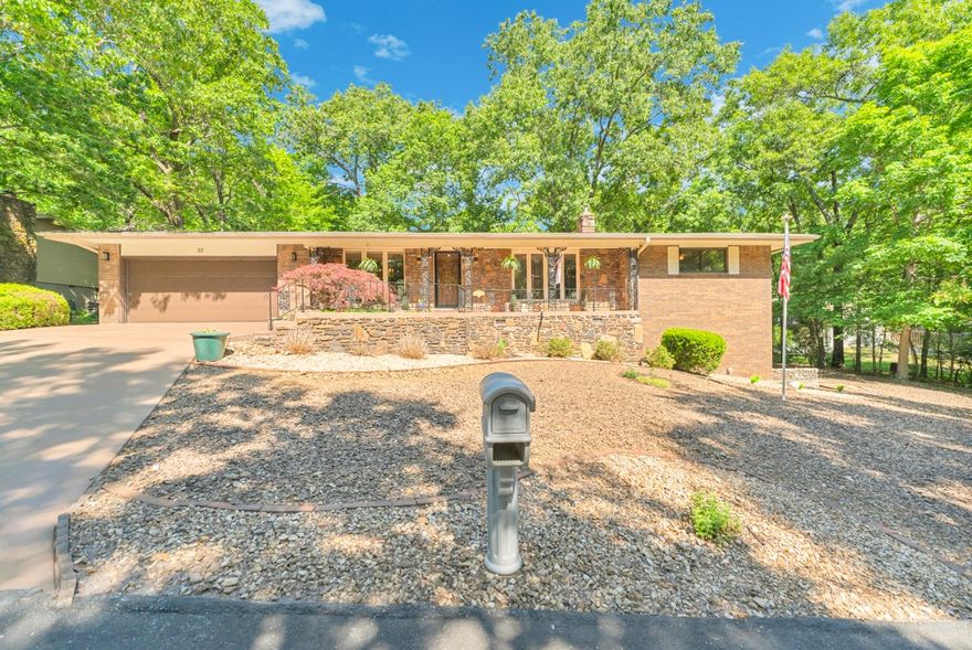 This home can easily be described in two words – a classic! The first thing you notice is the front porch, which is begging you to pull up your rocker and enjoy your favorite beverage. Inside, the hard-wood floors, the natural wood trim and kitchen cabinets, and the large light-emitting windows will quickly grab your attention. This home has plenty of room to enjoy, whether it's on the enclosed back patio or the 500+SF, heated and cooled, unfinished basement, just waiting for you to decide what it should be. The HVAC system is 1-year old in July; the roof was replaced 3 years ago, and the wood-burning stove in the living room is just two-seasons old. Enjoy your visit; take your time, and become acquainted with this “classic” beauty! It's calling you home.