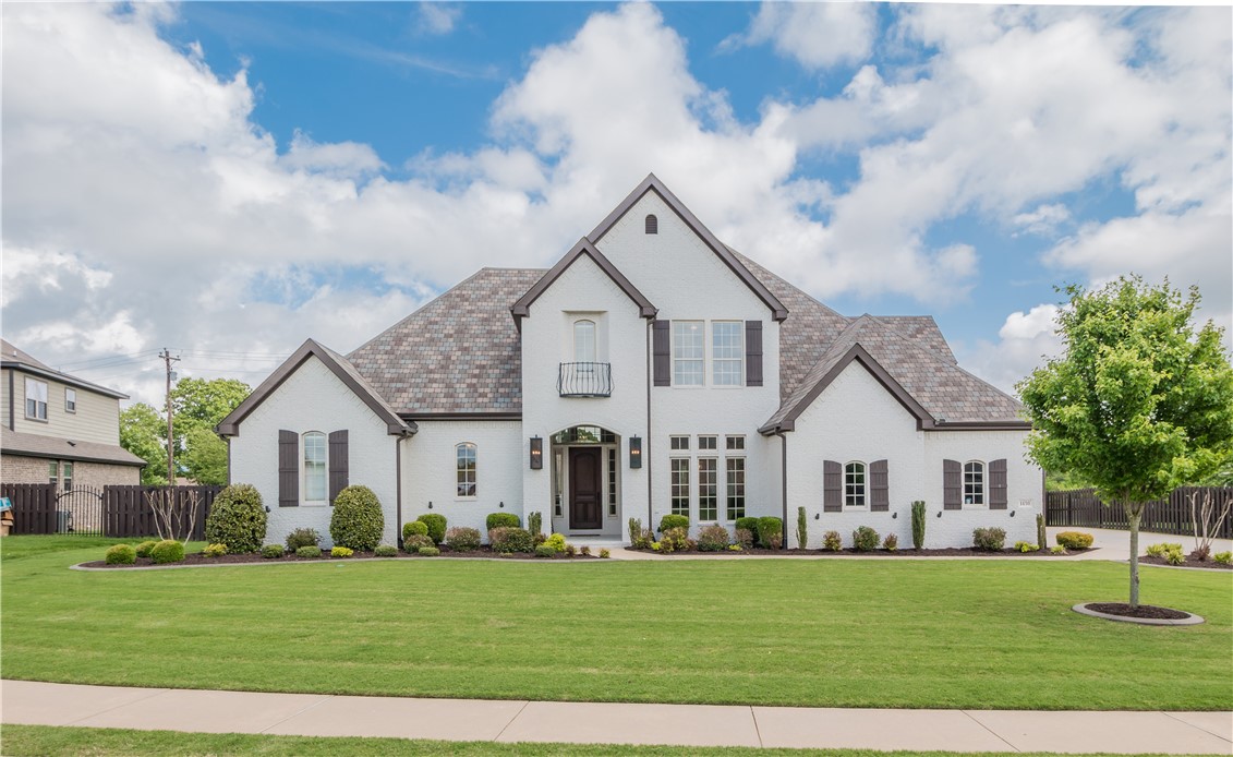 Prime location with easy access to downtown Bentonville! This completely updated home was made for entertaining with multiple living spaces and open layout. Main level features a chefās kitchen with custom cabinets, oversized island with extra storage & walk-in pantry open to a large living room with floor to ceiling windows and brick fireplace, a luxurious large master suite, second bedroom suite, full bathroom, study, dining room, wet bar & second living room. Upstairs features 2 additional bedrooms, 2 full bathrooms and a large bonus room. Outside is an amazing living and entertaining space with covered patio & fireplace, media hook-ups, and outdoor kitchen all open to a large private flat backyard. 4 car oversized garage with showroom epoxy flooring. Updates include new roof, solar panels, paint, counter-tops, outdoor kitchen addition, professional landscaping, designer light fixtures, new real hardwood flooring & carpet & more. Community amenities include pool, clubhouse and playground. Bentonville Schools