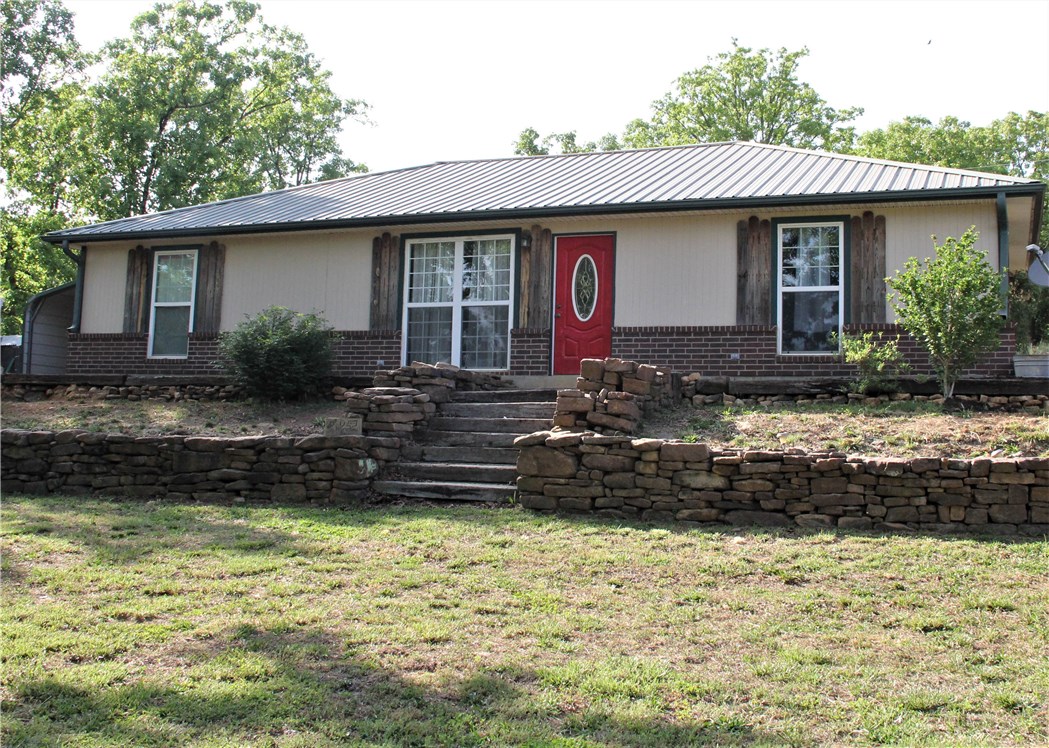 Beautiful 3 bed 2 bath country home! Move in ready! Open floor plan with cathedral ceilings. Metal roof, wood burning furnace with duct throughout. Propane for cooking, public water. Updates include newly installed carpet in all bedrooms, new HVAC and gas heater all installed in 2016. This home is a must see!