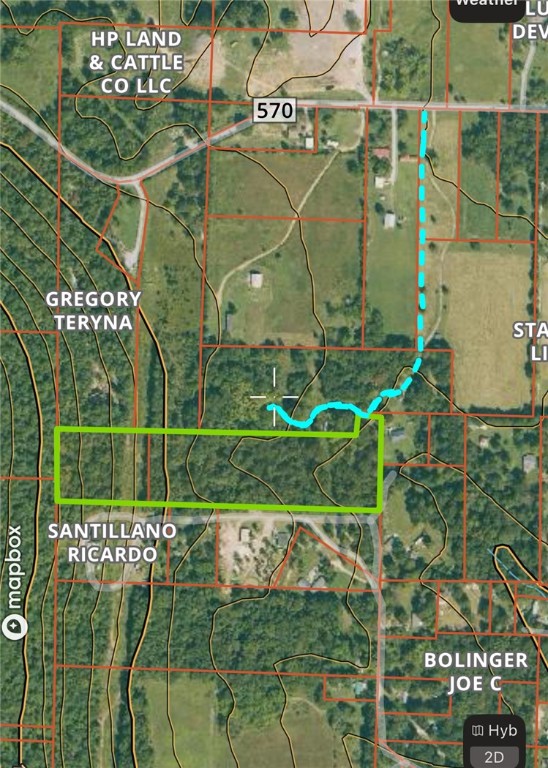 Looking for out-of-town privacy with ease of access to all necessities? This 9.73 acre tract is rolling with numerous building sites, wooded with large timber, and surveyed. Pavement to driveway access, power/fiber on property, water at the road. Nice property in a great location!