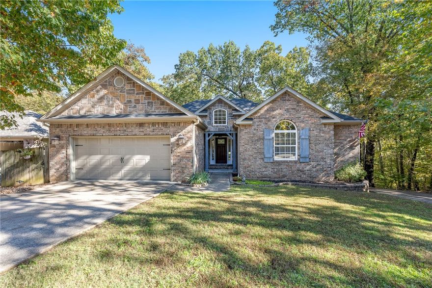 Exceptional location! This charming home backs up to Rago Trail and Dogwood Golf Course, just minutes from the Metfield Recreation area, trails, golf, fitness center, pool, tennis, and Lake Brittney access! Blending elegance with cozy cottage charm, it sits on a wooded lot with seasonal golf views and a large partially covered deckāperfect for relaxing or entertaining. Inside, enjoy 12-ft ceilings, crown molding, built-ins, and large windows framing the trees. The kitchen offers a large island, stainless appliances, breakfast room, and custom wainscoting. The living room with wood-burning stove opens to the dining room and covered deck. The spacious primary suite features a trayed ceiling and stunning bath with jetted tub, separate shower, and custom vanity. Two additional bedrooms share a Jack & Jill bath in a private wing. A large laundry includes folding counter, utility, and pet rinse sinks. Golf cart garage/workshop has its own drive and extra parking. Ride or walk to trails or golf right from home!