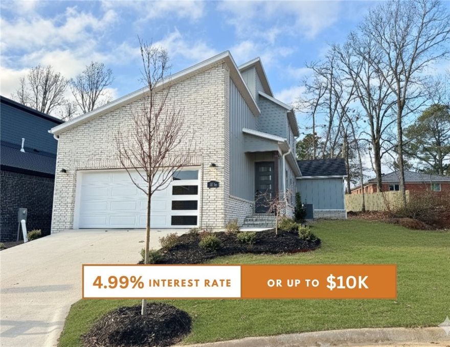 Discover this stunning modern home in the perfect East Fayetteville location—just a short walk to beloved Gulley Park! Porter floorplan featuring designer finishes throughout. Enjoy a spacious open floorplan with a large living room, electric fireplace, beautiful wood flooring and decorative stained beam headers surrounding. The chef’s kitchen boasts 3cm quartz countertops, stainless steel frigidaire professional-grade appliances, custom cabinets to the ceiling with soft close hinges, vented hood, and a walk-in pantry. The luxurious primary suite includes an accent wall, hardwood floors, and a spa-like bathroom with walk in tile shower, double sinks and walk in closet. Oversized secondary bedrooms, large covered patio, and included blinds and gutters, this home blends comfort, style, and convenience in one unbeatable package. POA maintained lawncare!