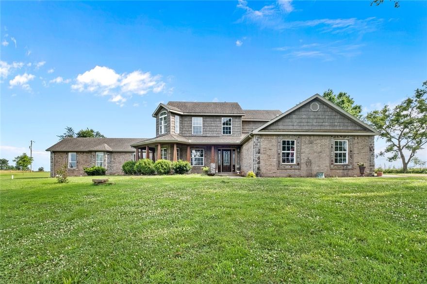This spacious home sits on 5 acres in Bentonville! With over 3,600 feet of space, a shop, and no HOA, the possibilities are endless. The location is hard to beat and is surrounded by so much growth. You'll love the kitchen with granite countertops and more cabinet storage than you can dream of. Similarly the master suite has an enormous walk-in closet and the bathroom offers dual vanities with plenty of storage as well as an oversized shower. Enjoy the back patio which is perfect for entertaining with an enclosed yard area. The workshop is great for storage, hobbies, landscaping equipment or for any other purpose. Schedule a showing and see this beautiful home today!