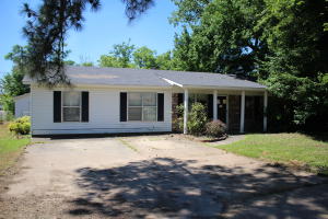 3 bedroom 2 bath home on corner lot. Fenced backyard and workshop. No entry to property without a licensed real estate agent.