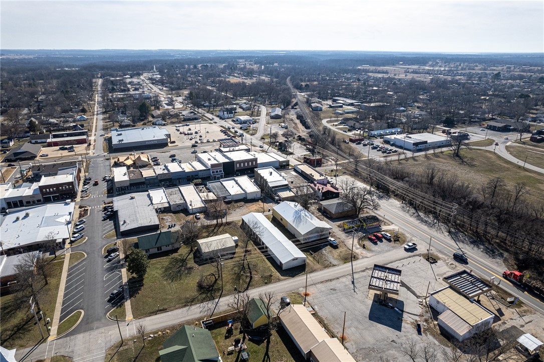 Investors take note! This is a 29-unit self-storage building located in the bustling downtown area of Gravette, AR. A rare opportunity to own a downtown parcel in the growing area of Northwest Arkansas. You can enjoy a steady stream of passive rental income from a diversified tenant base. Over 85% occupancy, there is potential for income consistency and growth. The roof has been recently replaced, ensuring minimal maintenance costs in the near future. No utilities to worry about. New 2025 rates are not yet in effect, offering the potential for even greater returns on your investment. The Gravette area is evolving and growing, offering the potential for long-term appreciation of your investment. The lot itself has great redevelopment potential in the center of town. With its convenient location in downtown Gravette, these units are pretty self-sustaining while anticipating the growth to come. Agent owned. Add'l mini storage listing available at 150 SE Charlotte St. See ML#1303029. Agent owned.