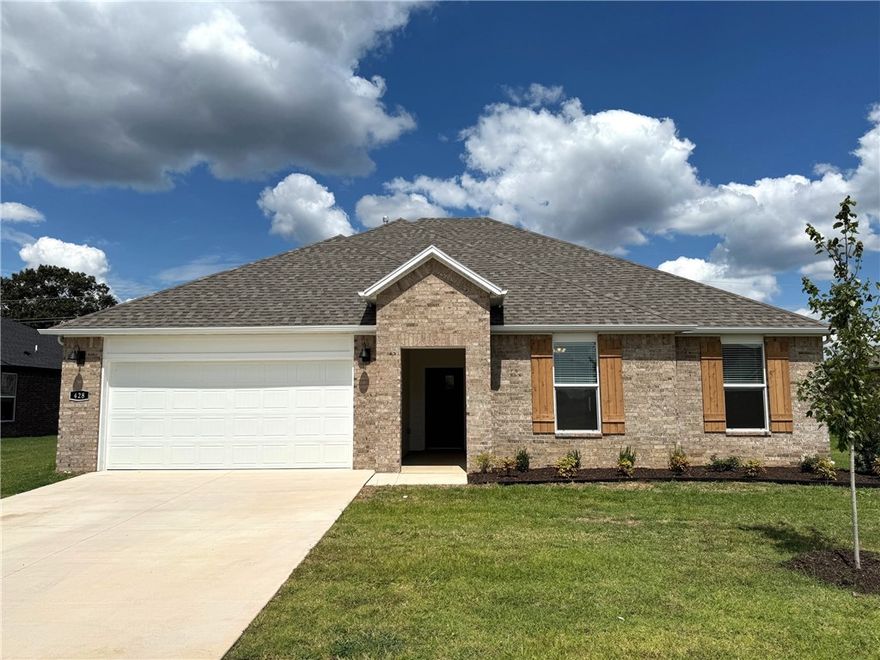 Terrific Truman plan in Goose Creek Village, an impressive subdivision where quality and affordability meet in the heart of Farmington. This home features gorgeous quartz kitchen countertops, stainless steel appliances and a walk-in pantry (per plan). 42-inch upper cabinets with top molding and soft close cabinet doors. Private bedroom one includes a lovely en-suite with quartz counter tops, double sinks, walk-in shower, and walk-in closet. Living room will showcase a beautiful modern Electric Fireplace. These homes feature ceiling fans in all bedrooms and living room! Each home exterior will have brick and HardieĀ® siding per plan! Covered patio (per plan). Garage Door opener! Taxes and Parcel # TBD. Single-story plans feature Luxury Vinyl plank flooring throughout!