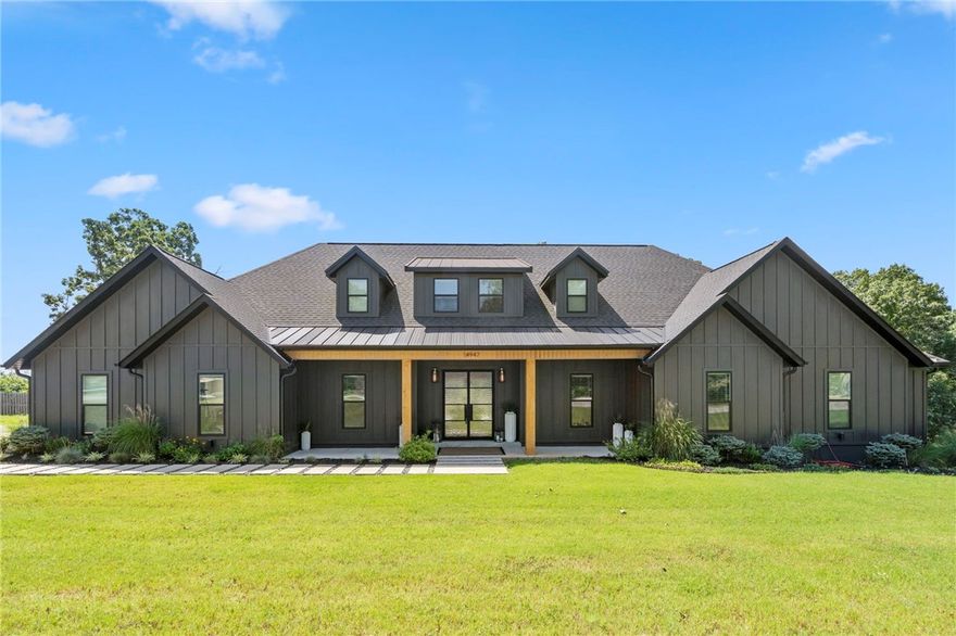 This is the luxury lake lifestyle everyone wants.
Set on a rare, flat 1.4-acre lot, this Key Concepts home offers the space to add a pool, a shop, or both. Inside, tall ceilings, Cambria quartz countertops, custom cabinetry, designer lighting, and a warm, refined design create an elevated living experience. The layout includes 4 bedrooms, 2.5 baths, a dedicated office, and a versatile loft ideal for a media room, game room, or second workspace.
Practical upgrades include a 400-amp panel ready for a generator, hot tub, or workshop, plus EV-charger wiring. Preferred lenders are offering $3,50000 in credits. Learn more about the builder at www.yourkeyconcepts.com. This home blends elegance, functionality, and the best of Beaver Lake living. Boat, lift, and leased slip may be purchased separately for a complete lake-life package.