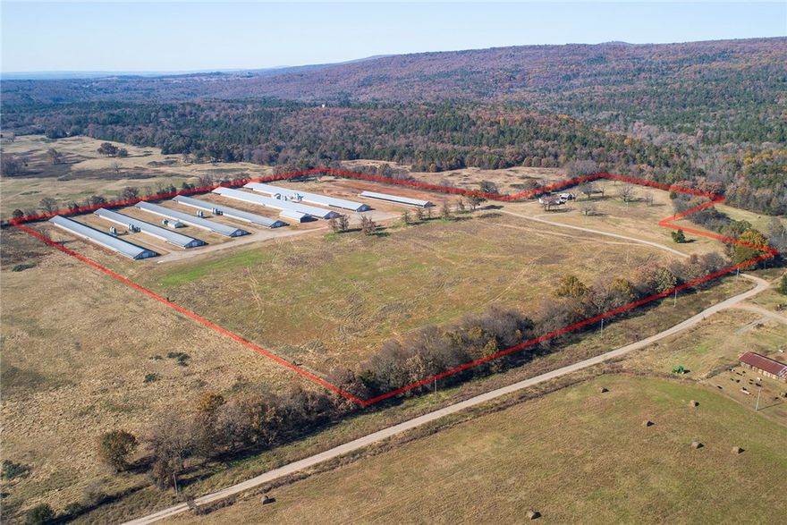 This is a NICE farm! 4 2007 built 43x510s and 2 2018 built 54x550s for an annual income about $375,000. Some of the building incentive still remains. Farm is on natural gas and has public water to backup 5 wells. The stacking shed is just six months old. The 40 acres is open and level with productive pasture. The double wide is in good condition and has a workshop as well to keep tools and do repairs. We are pleased to offer this fine farm with an OK Foods contract in this peaceful country setting!
