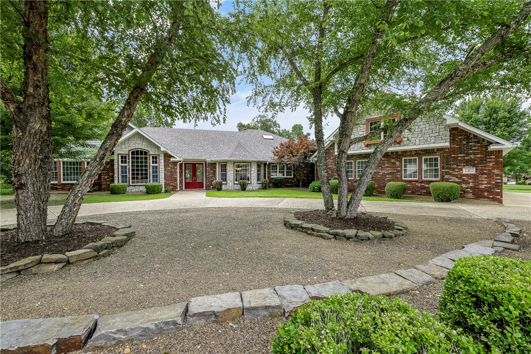 One-of-a-kind home with the definite Wow factor. Personal home of one of the top builders in Bella Vista. This one-level home boasts a Chef's Kitchen, Custom Maple Cabinetry, Detailed Wood Ceiling in Den, Custom Crown Molding, & Large Baseboards - rare in Bella Vista. The home presents an opportunity to reside in a comfortable, well-maintained home in a picturesque neighborhood. With its appealing design, functional layout, & desirable location, this property offers a beautiful place to create lasting memories & enjoy a fulfilling lifestyle! The gorgeous sunroom w/180° views of the backyard is the perfect space to entertain or take in the unobstructed view of the tree line surrounding the property. The property's exterior is equally impressive, w/well-maintained front yard & private backyard to enjoy the natural surroundings, hosting outdoor gatherings, or simply unwinding after a long day. The garage offers shop space w/extra lighting, electrical circuits & still room for 2 cars! PERC 2 bdrm w/750gl septic tank.