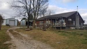 Comfortable 3 BR Farm House sitting on 32 AC/ML with a 10 AC hay field M/L with nice pond and pretty distant views of adjoining properties. Property includes a Shop building with concrete floor and equipment shed. Big Year Round Spring is on this property! Property is a short distance off pavement on a dead end road.