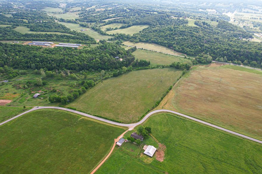 Tucked away on the peaceful outskirts of Siloam Springs, this stunning 17+/- acre tract offers a rare blend of open space, usability, and quiet country charm. Gently stretching across flat, cleared ground, the land feels expansive from the moment you arrive—sunlight pouring over wide-open pasture with endless possibilities in every direction.
Whether you’re envisioning a custom home set back from the road, a hobby farm, or a private retreat, this property provides the perfect canvas. The level terrain allows for easy building, while the agricultural setting invites horses, gardens, or future development potential.
Surrounded by natural beauty yet just a short drive to town, you’ll enjoy the ideal balance of privacy and convenience—located just a few miles from U.S. Route 412 and Highfill. Well and septic will be needed, offering flexibility to design and build to your exact specifications while enjoying peaceful mornings and star-filled nights.