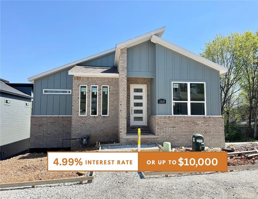 Discover this stunning modern home in the perfect East Fayetteville location—just a short walk to beloved Gulley Park! Malcom floorplan featuring designer finishes throughout. Enjoy a spacious open floorplan with a large living room, electric fireplace, custom beams, accent wall and beautiful wood flooring. The chef’s kitchen boasts 3cm quartz countertops, stainless steel frigidaire professional-grade appliances, custom cabinets to the ceiling with soft close hinges, vented hood, and a walk-in pantry. The luxurious primary suite includes hardwood floors, and a spa-like bathroom with walk in tile shower, soaking tub, double vanities and walk in closet. With a formal dining area, large covered balcony, extra storage and included blinds and gutters, this home blends comfort, style, and convenience in one unbeatable package. POA maintained lawncare and access to Niokaska Creek Trail from the neighborhood!