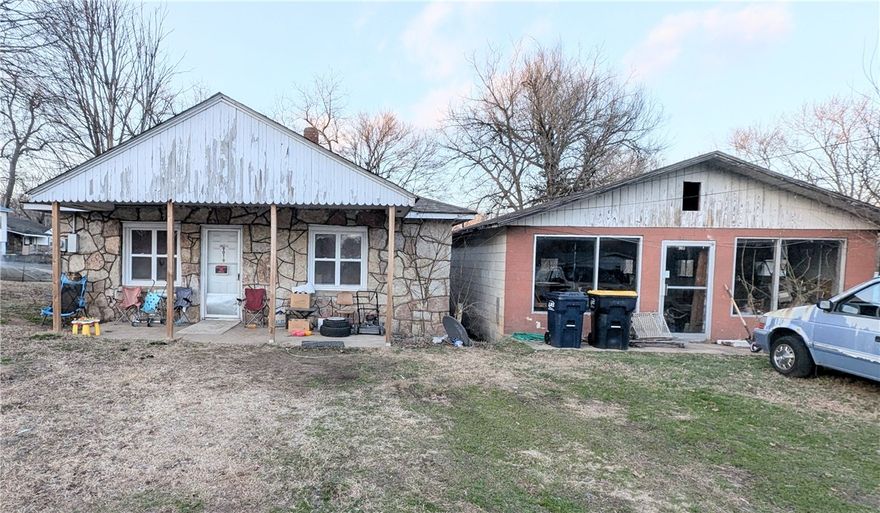 Here is a great opportunity to make two different buildings your next dual-purpose income generator or as they say, a great "two-for-one option". This property is right in the heart of town, just minutes from the park, food, and shopping. With some work and an eye for design, these properties could serve as a great revenue source for your next home renovation and sale or multi-rental option.  One property with over 914 sq. feet is currently being used as a rental and the second was an old store with over 1,000 square feet of usable space ready to be remodeled the way you want. Come by and schedule a time to see if this next project is what you were waiting for. Please note, that both properties are being sold "AS IS".