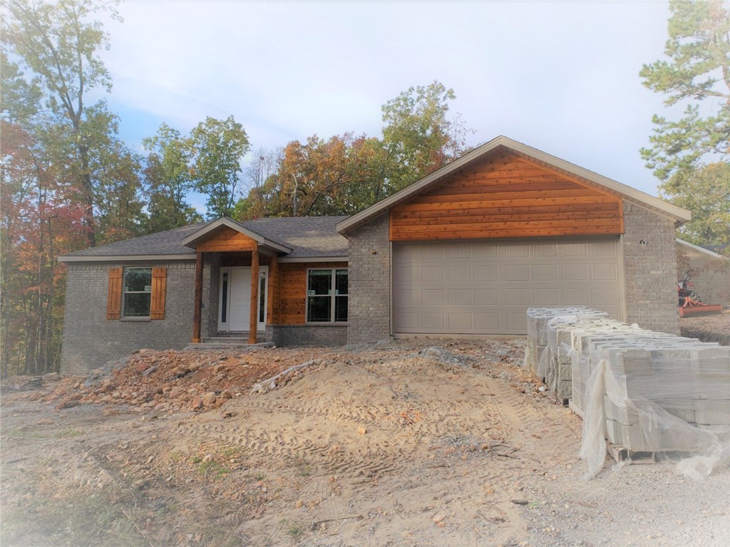 New Construction on level corner lot w/ sewer, Features granite countertops w/ tile backsplash, tile flooring in wet areas, hardwood in L.R. + carpet in bedrooms. Tile shower in MBA. Landscaping to be sod in front and side yard w/ seed in backyard. See pictures of sold listing @ 8 Brierfield as decor will be similar....